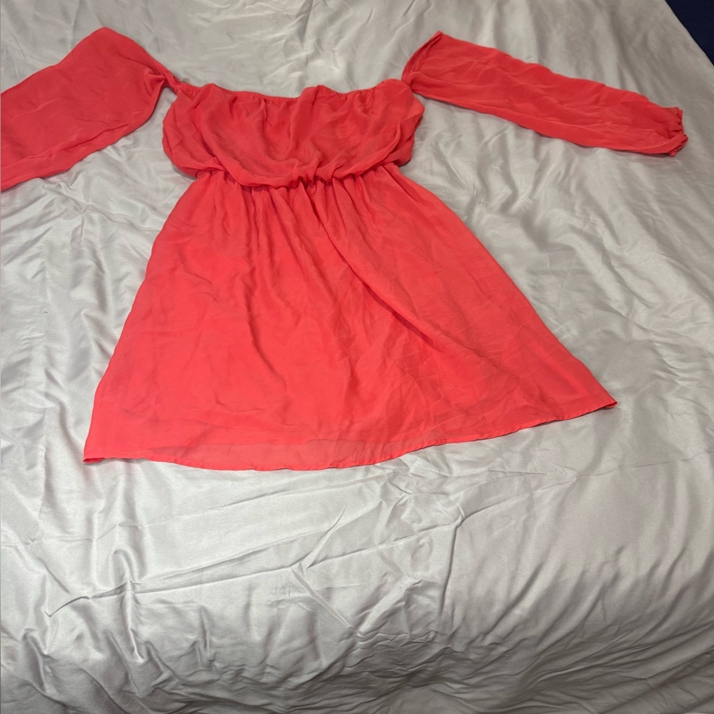 Coral color off the shoulder sleeves 100% polyester. Size M. By Rachel Kate